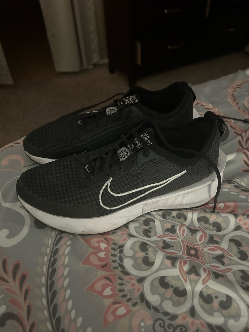 Nike Men’s Black Sneakers with White Swoosh